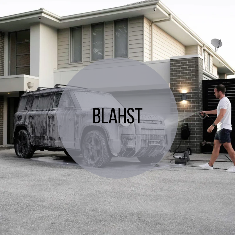 Blahst car cleaning equipment with car being cleaned behind the word Blahst