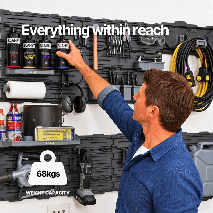 Man reaching into a Blahst tool storage system with various tools and equipment.