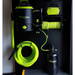 BigBoi cleaning system with black tank, green hose, and canister on a black background
