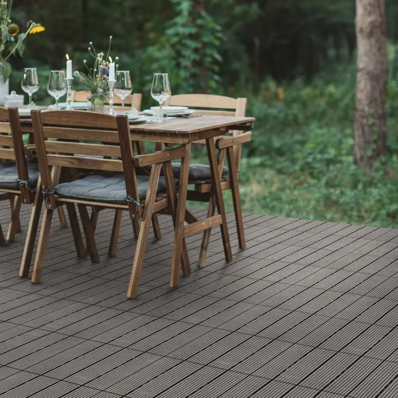 DeckFlex Pro floor tiles in grey with outdoor table