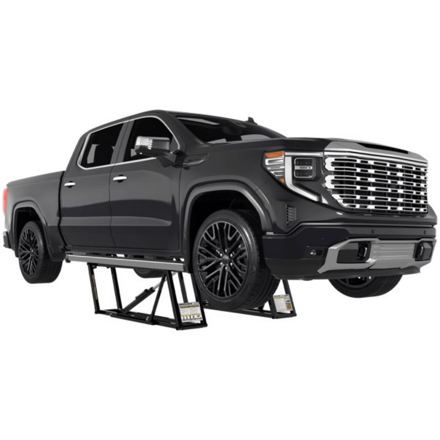 Gray pickup truck on a Quickjack 8000TLX on a white background