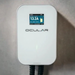 White electronic vehicle charger with a digital display on a gray background, branded 'Ocular'.