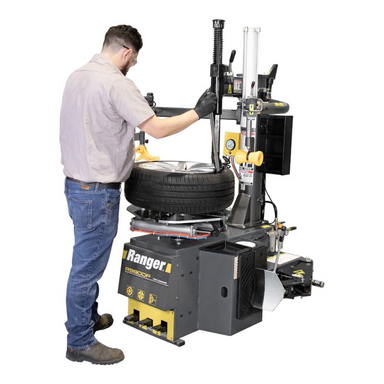 R980DP tyre changing machine with person removing tyre
