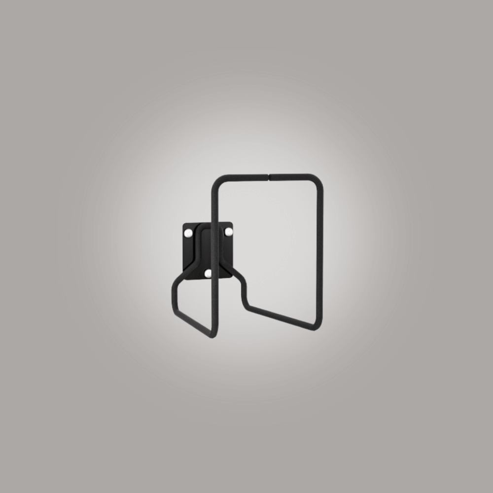 Black metal wall hook on a gray background