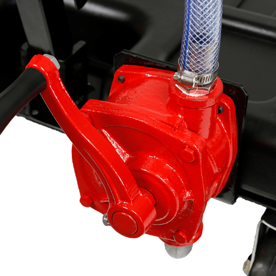 Red hand pump with a hose attachment on a white background