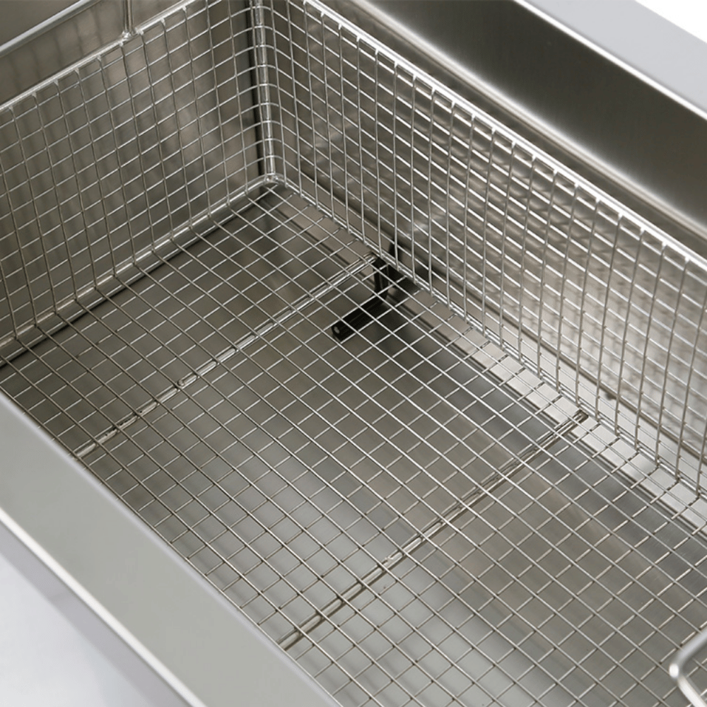 Metal wire basket inside an ultrasonic cleaner