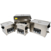 Set of four stainless steel Tradequip ultrasonic cleaners on a white background