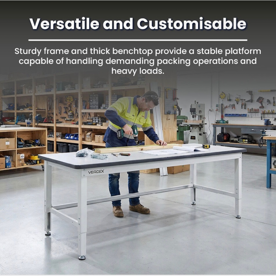 Person working on a large workbench in a warehouse setting with text highlighting the table's versatility and customizability.