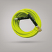 Coiled yellow garden hose with black and gold connectors on a gray background