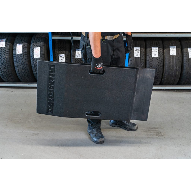 Liftmotive extension ramps set up at a car lift