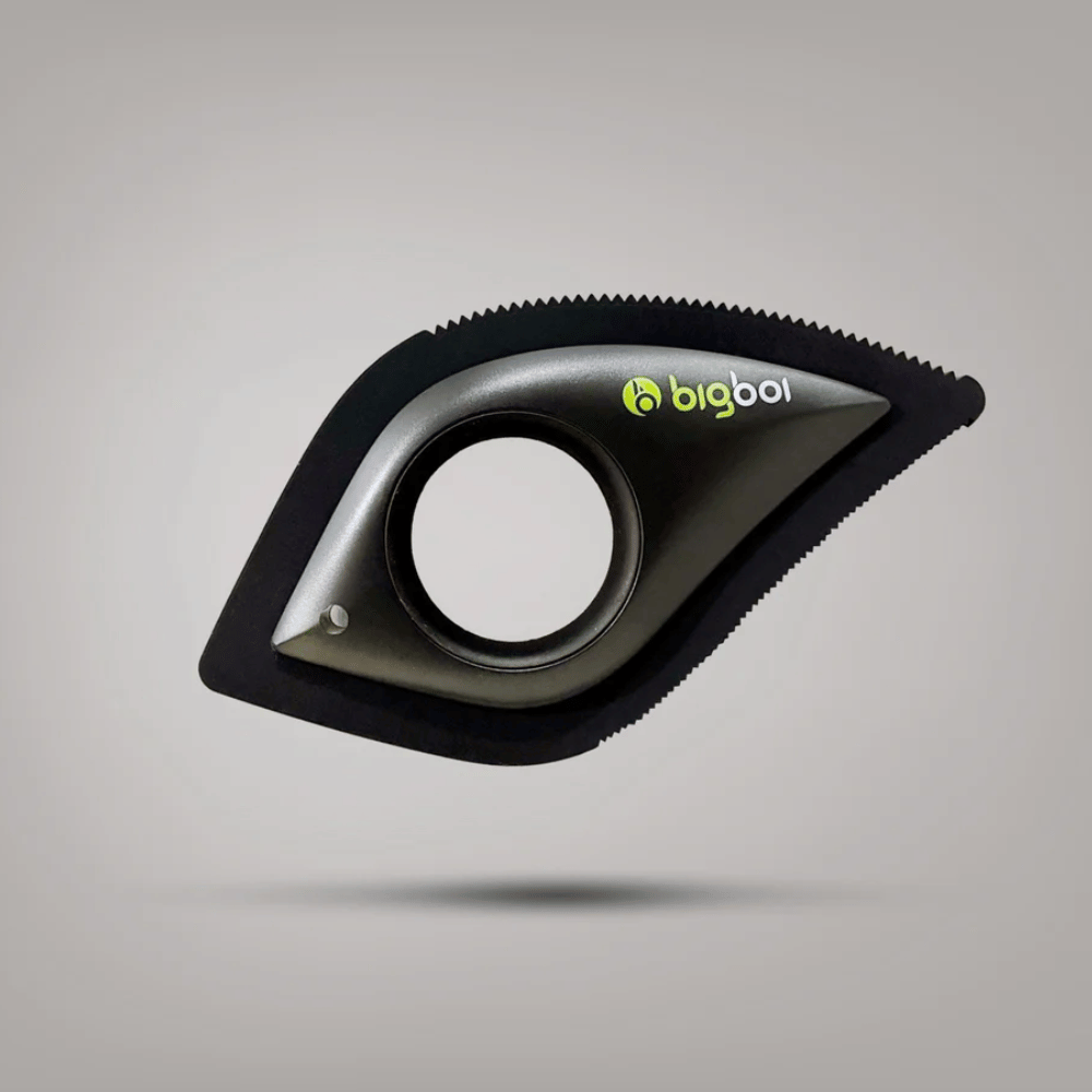 Black pet hair remover with 'bigboi' branding on a gray background