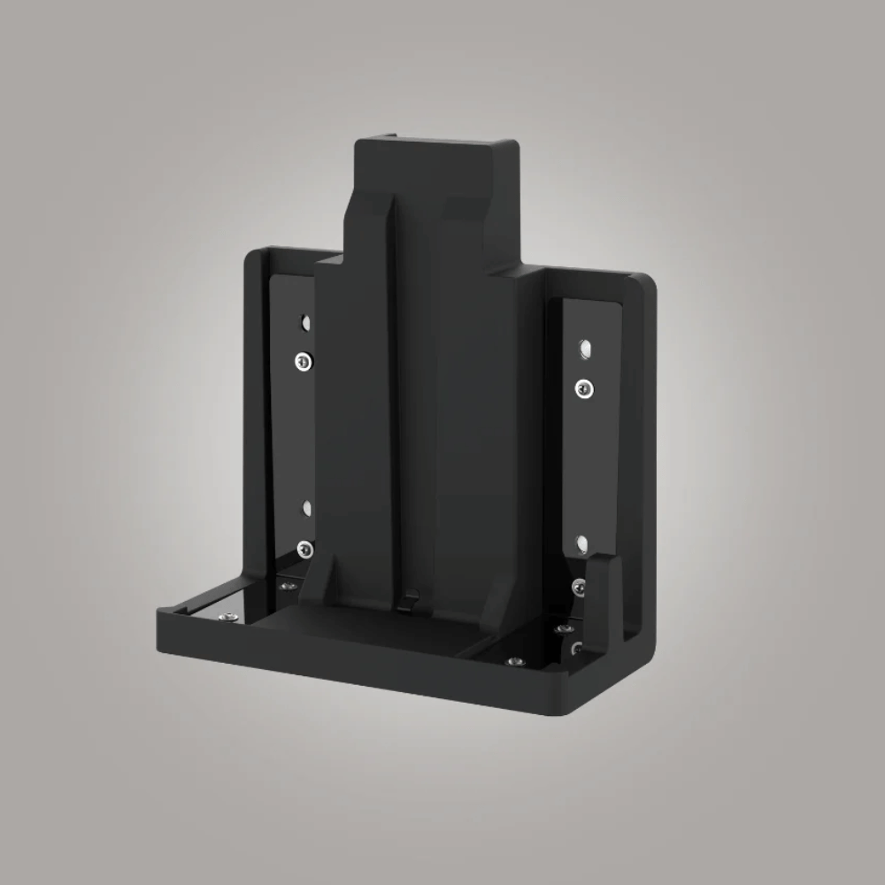 Black bracket for Bigboi vacuum on a gray background