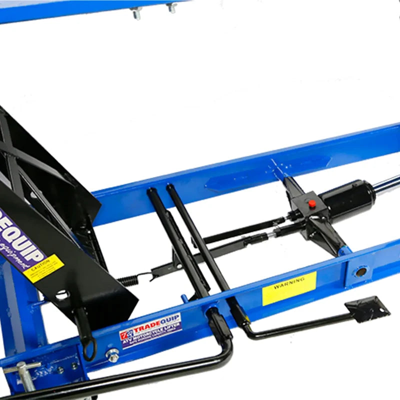 Lift and release foot pedals on the TradeQuip 2101T motorcycle lift