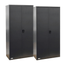 Two black metal storage cabinets on a white background