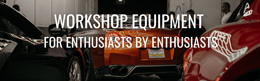 Orange car in a garage with text about workshop equipment for enthusiasts.